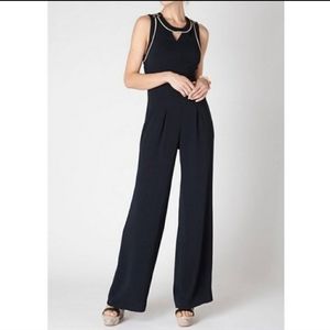 Cartonnier anthropologie navy blue jumpsuit size medium